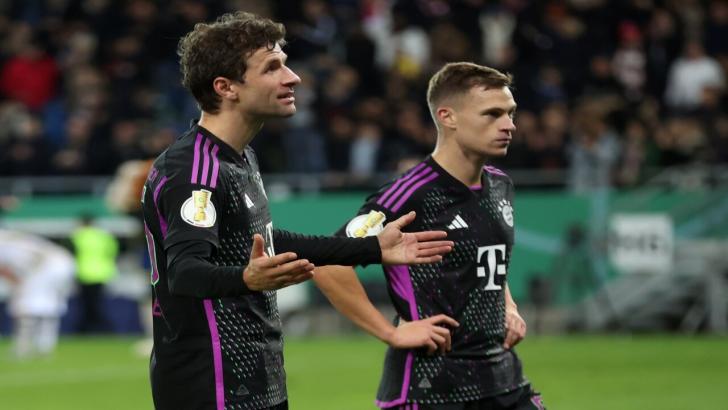 Bayern's Thomas Muller and Joshua Kimmich react to defeat in the DFB Pokal